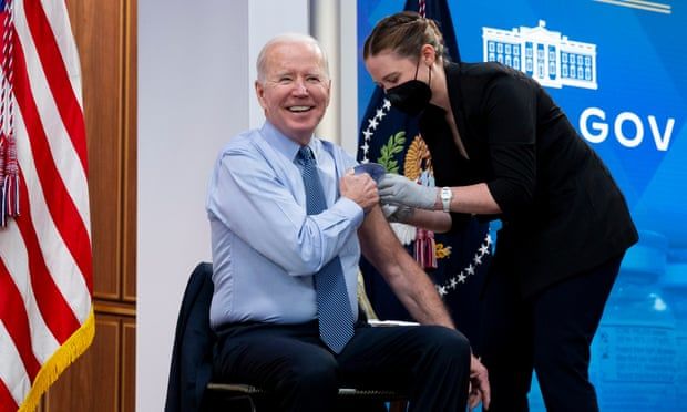 Biden receives second Covid booster as he pleads with Congress for funding