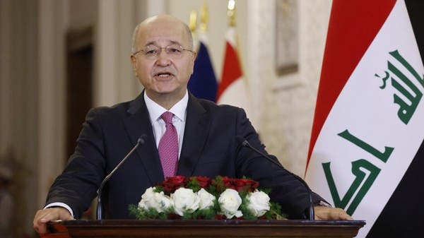 Iraq president encourages early elections to end crisis