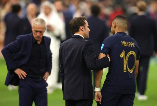 Awkward moment Emmanuel Macron tugs on Kylian Mbappe’s arm after World Cup loss
