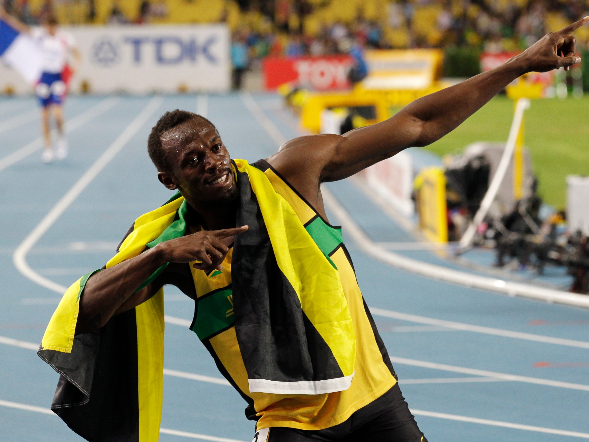 Jamaica's Usain Bolt celebrates winning the Men's 200m final at the World Athletics Championships in Daegu, South Korea