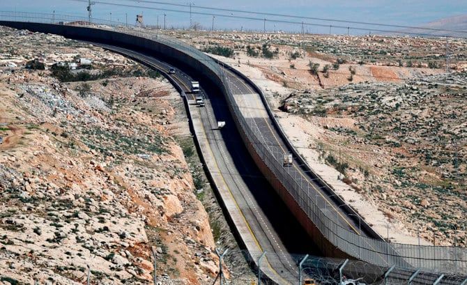 Israel building concrete wall to protect highways near Gaza Strip