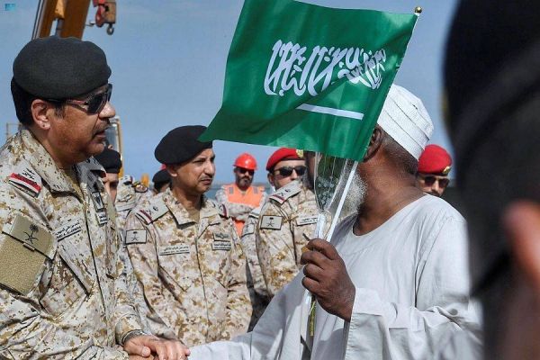 Saudi security men greet foreign evacuees in their own languages