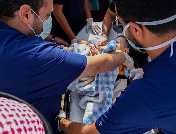 Syrian Siamese twins arrive in Riyadh for surgery