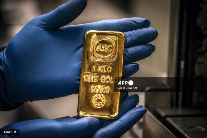 Gold retreats as dollar gains upper hand