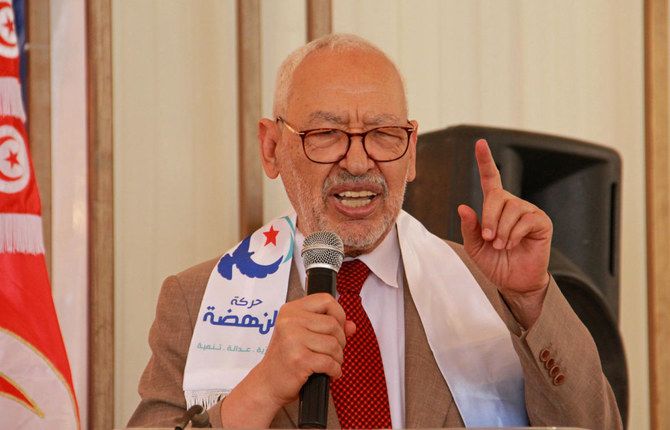 Tunisian judge sentences opposition leader Ghannouchi to a year in absentia