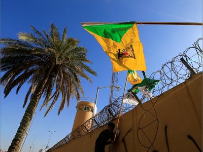 Kataib Hezbollah, Influential Iraqi Faction, Halts Assaults on US Following Drone Attack
